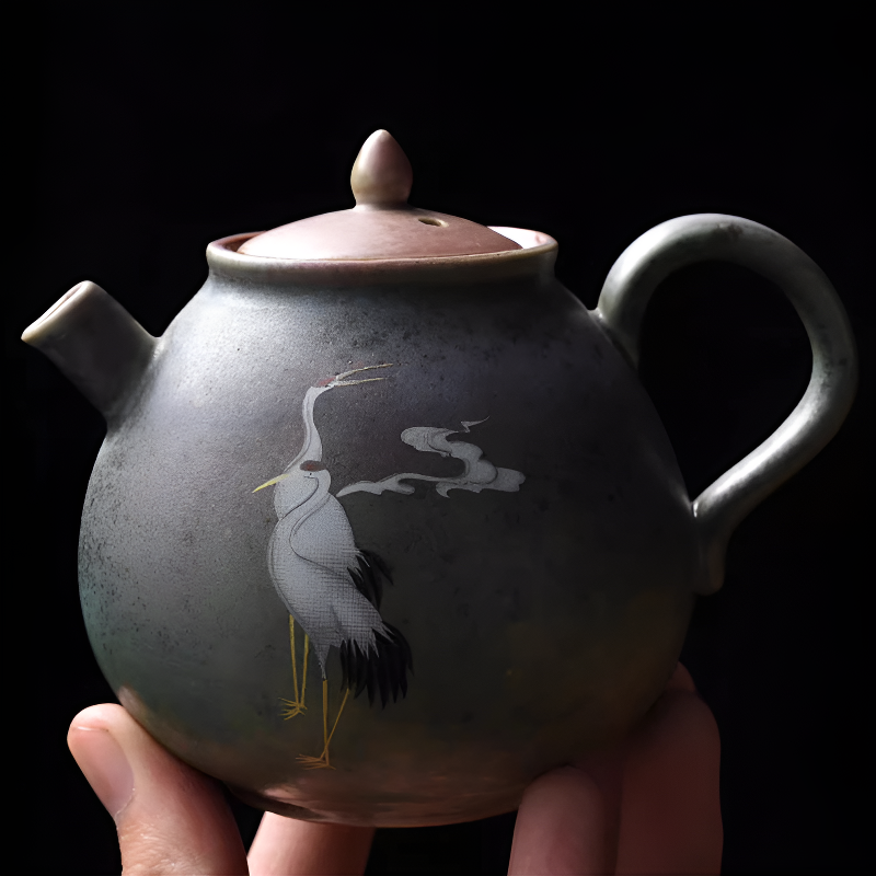 Antike schwarze Teekanne