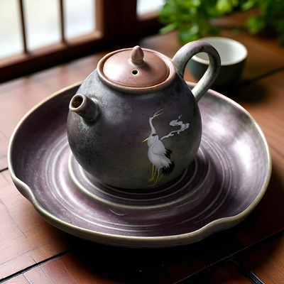 Antike schwarze Teekanne