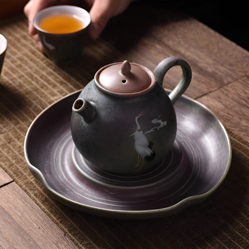 Antike schwarze Teekanne