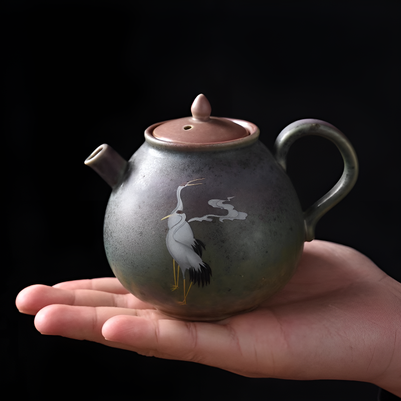 Antike schwarze Teekanne