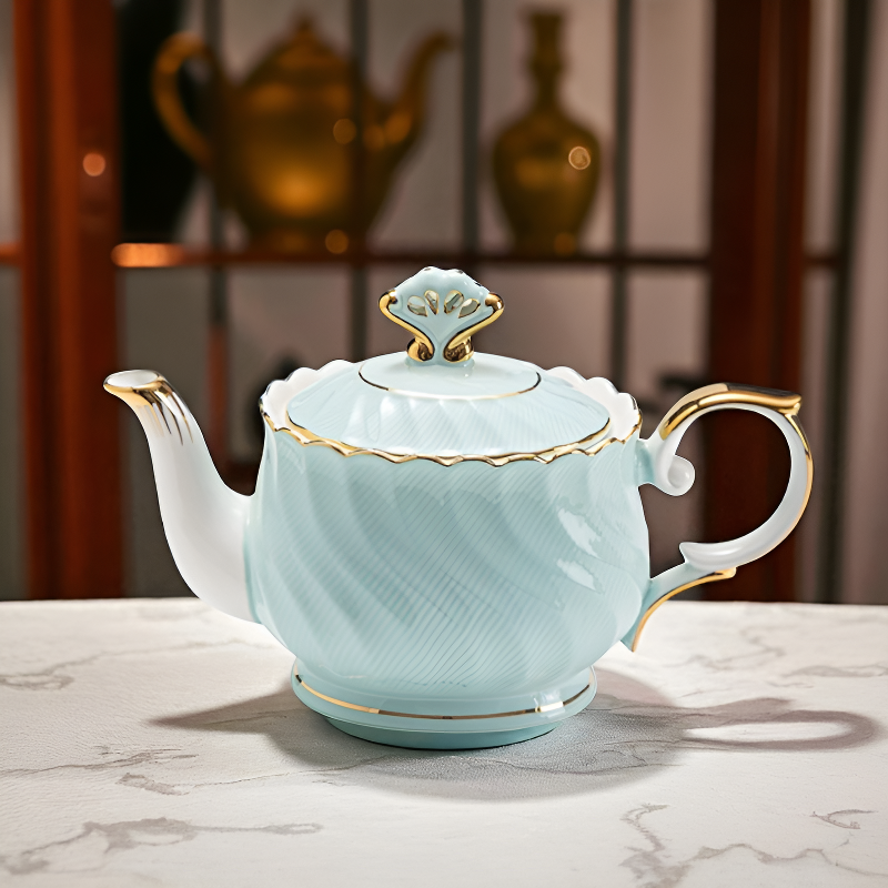 Englische Teekanne vergoldet