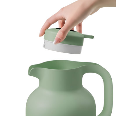 Grüne isolierte Teekanne