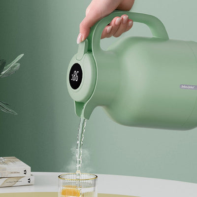 Grüne isolierte Teekanne