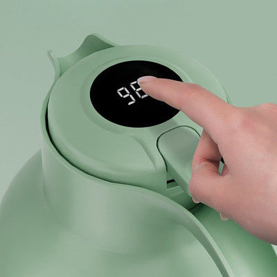 Grüne isolierte Teekanne