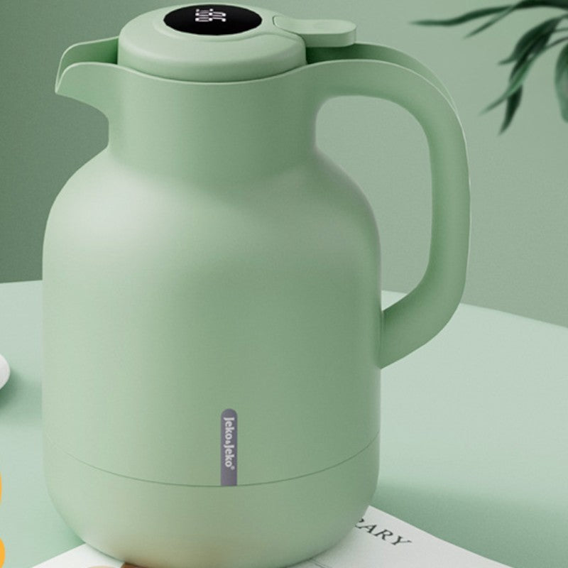 Grüne isolierte Teekanne