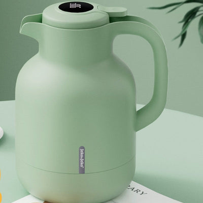 Grüne isolierte Teekanne