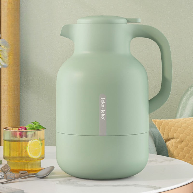 Grüne isolierte Teekanne