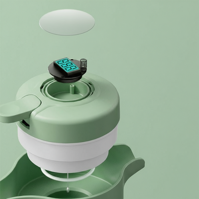 Grüne isolierte Teekanne