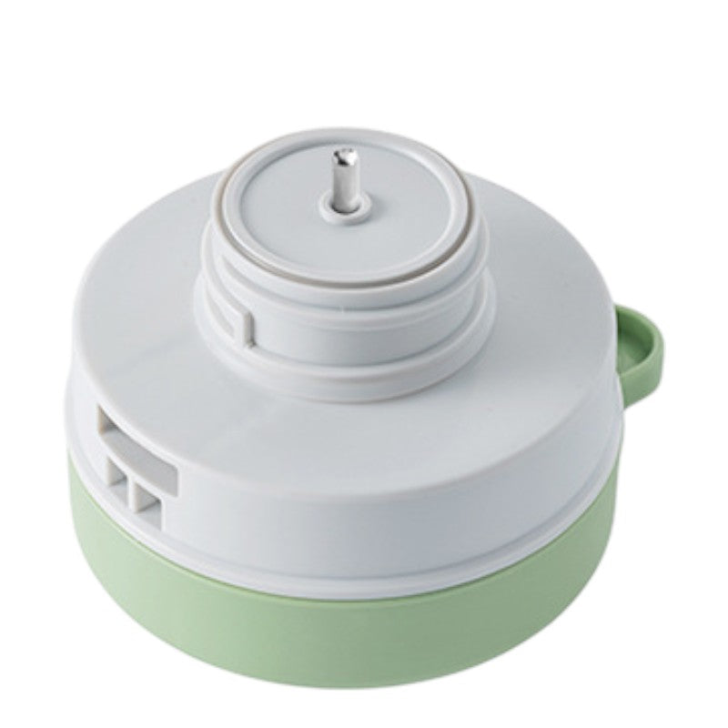 Grüne isolierte Teekanne