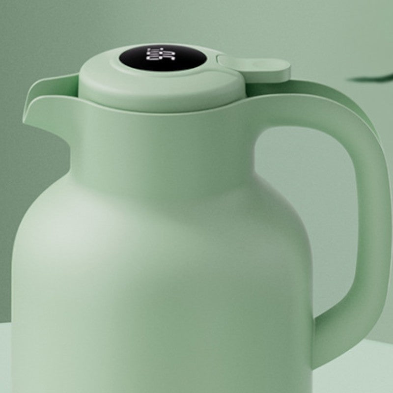 Grüne isolierte Teekanne
