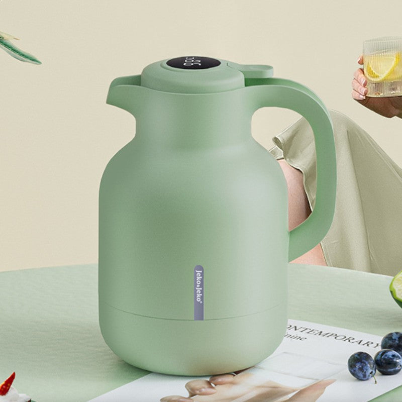 Grüne isolierte Teekanne