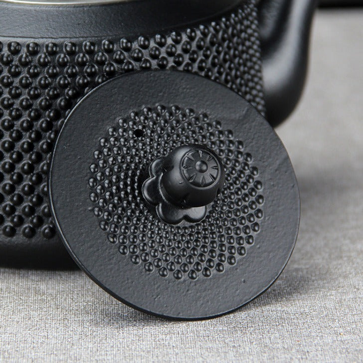 Gusseisen teekanne herdplatte