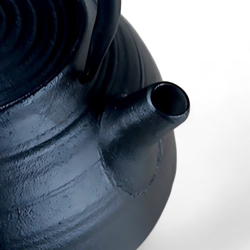 Gusseisen teekanne tee