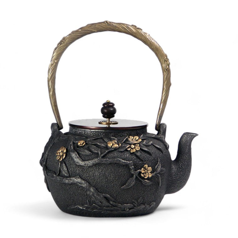 Gusseisen teekanne wärme