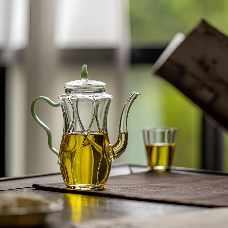 Kleine individuelle Glas-Teekanne