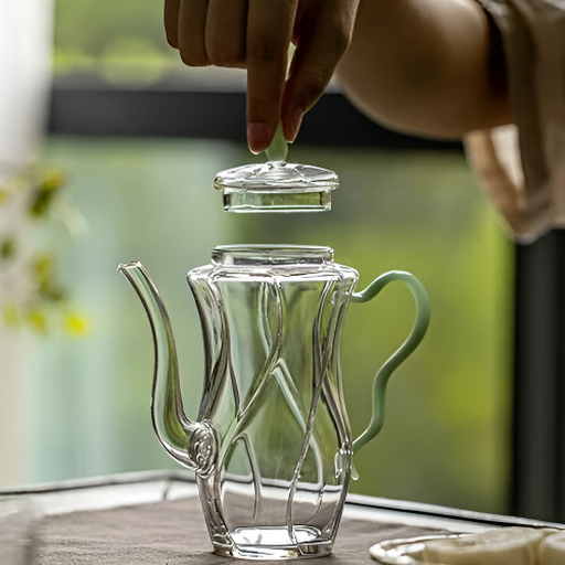 Kleine individuelle Glas-Teekanne