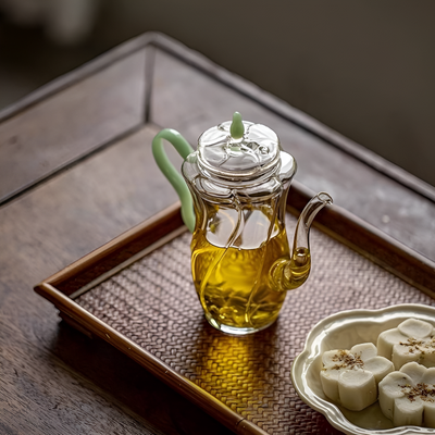 Kleine individuelle Glas-Teekanne