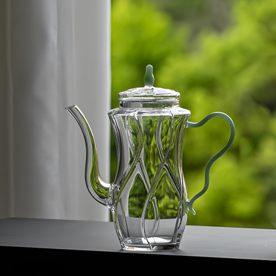 Kleine individuelle Glas-Teekanne