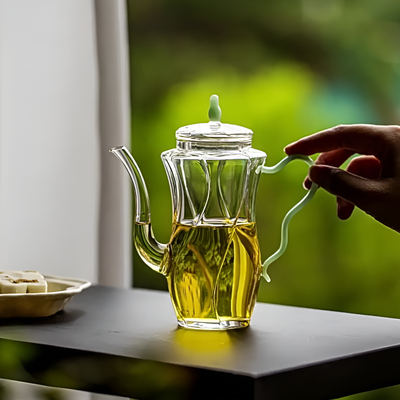 Kleine individuelle Glas-Teekanne
