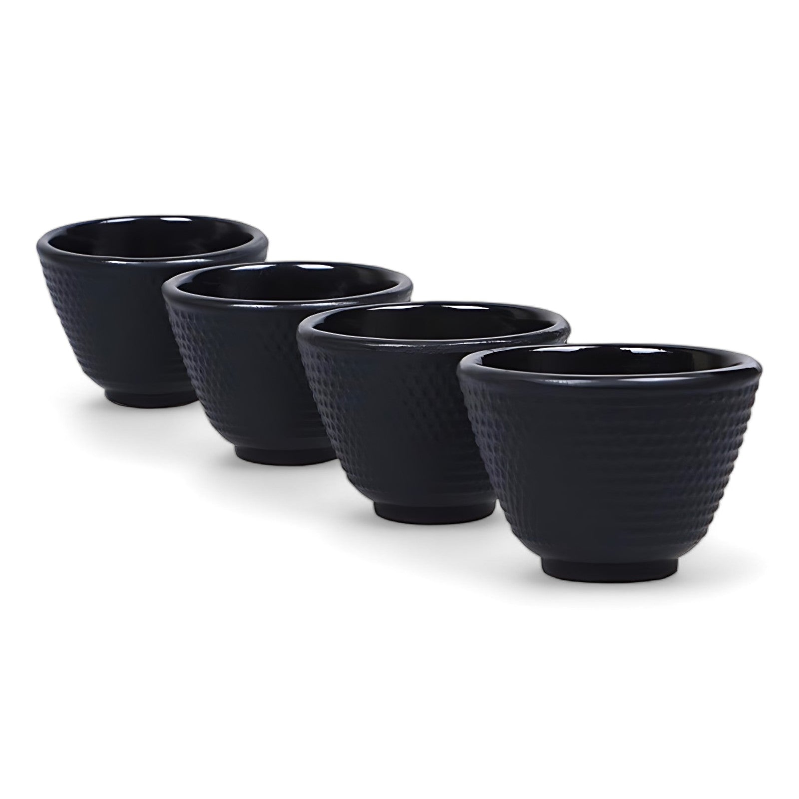 Teekanne aus gusseisen mit tassen