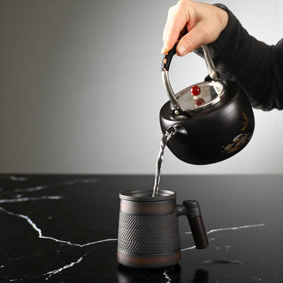 Teetasse mit Sieb aus Terrakotta