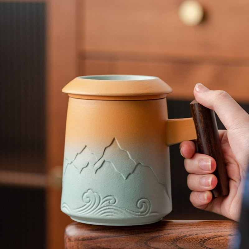 Teetasse mit Sieb und Deckel