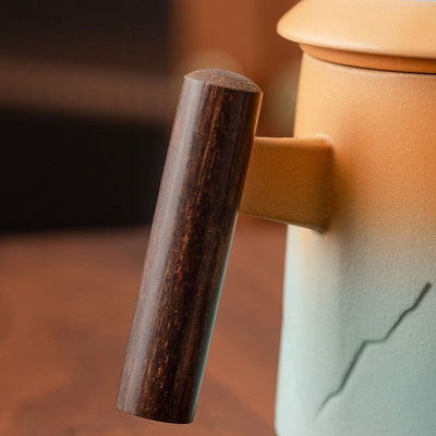 Teetasse mit Sieb und Deckel