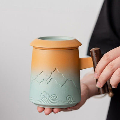 Teetasse mit Sieb und Deckel