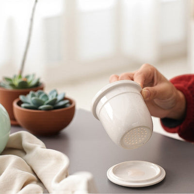 Teetassen-Set mit Sieb