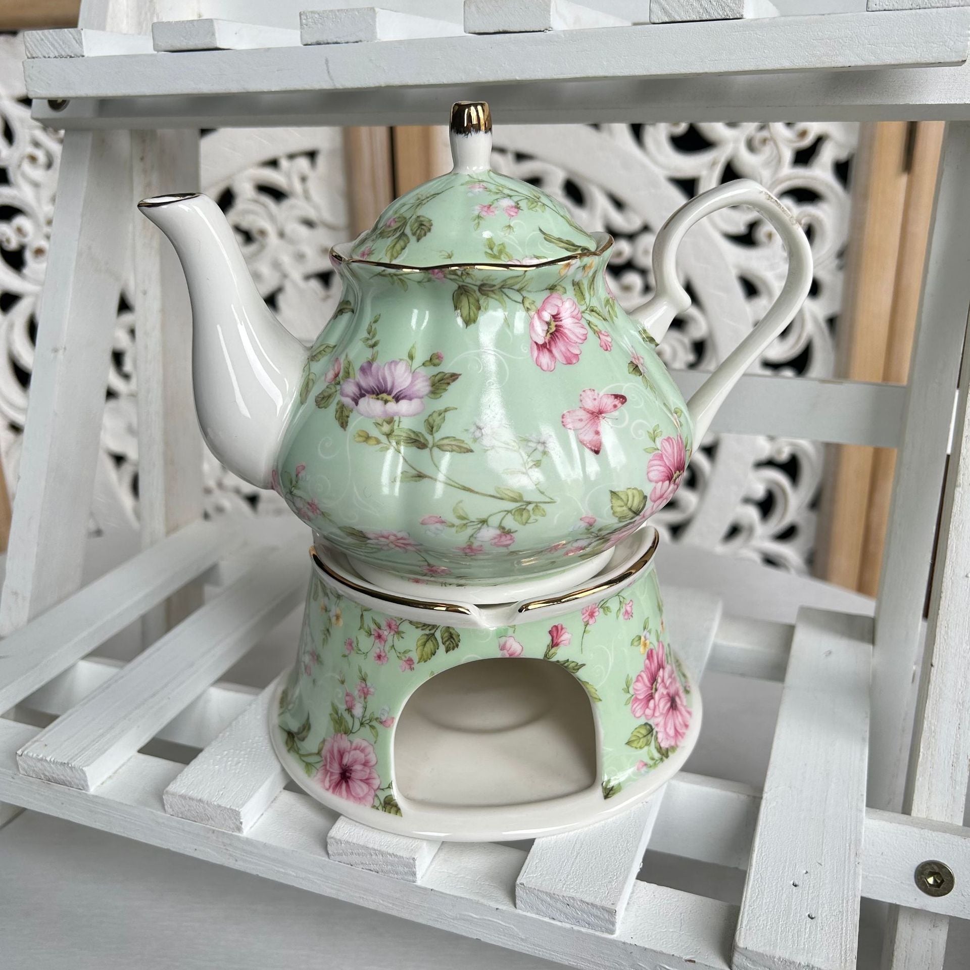 Traditionelle englische Teekanne aus grüner Porzellan